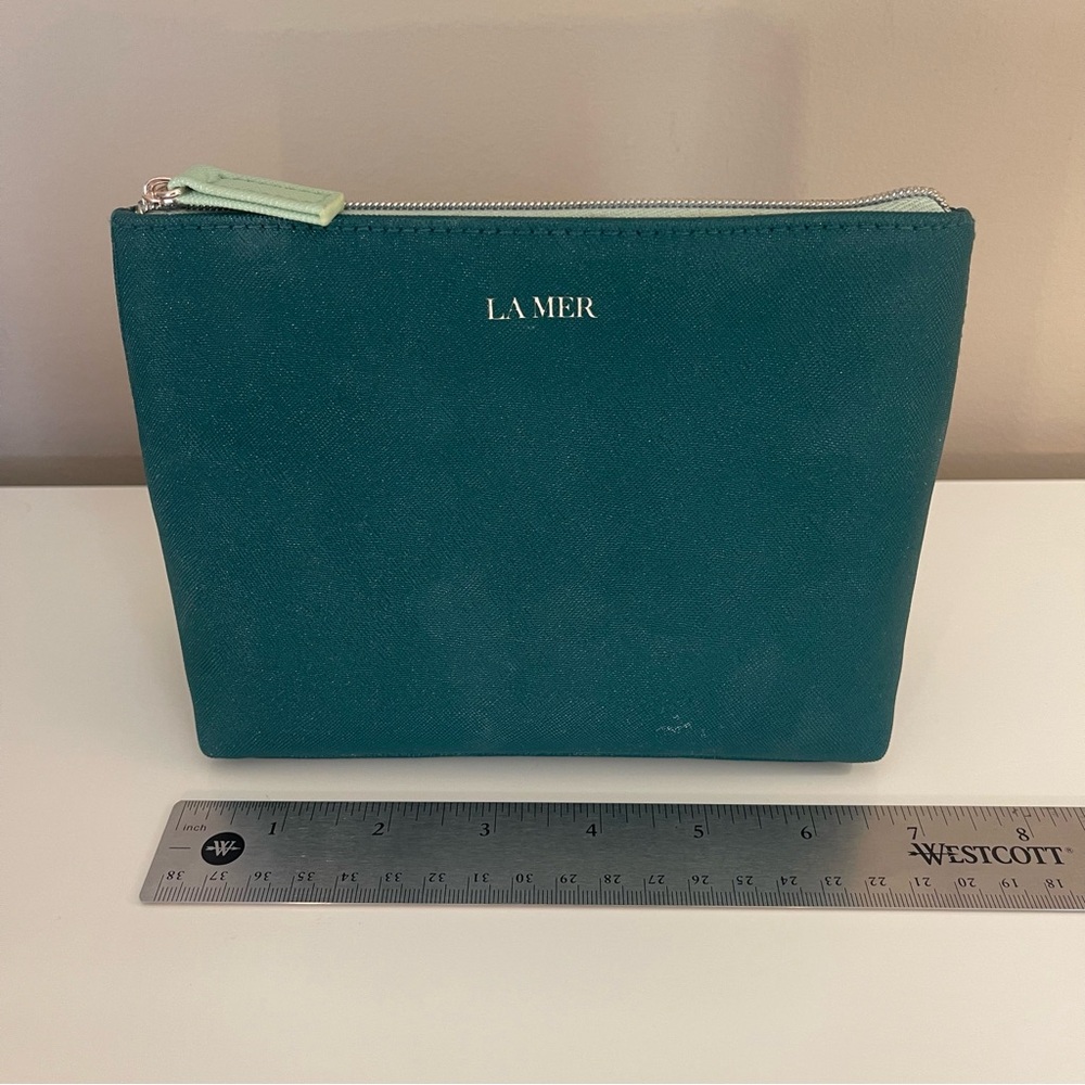La Mer cosmetic makeup travel bag in blue teal / green
